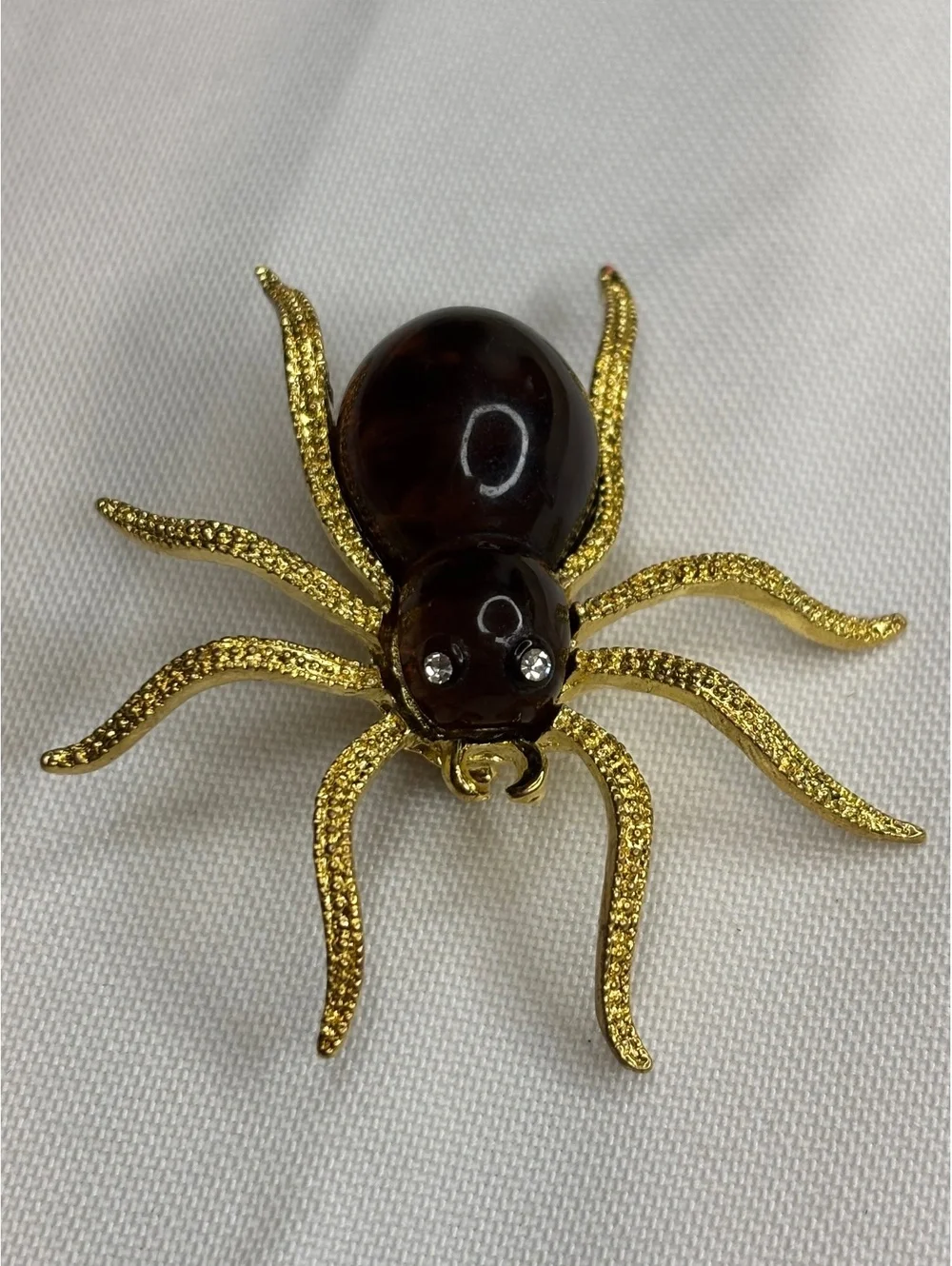 Vintage Lucite Spider Brooch with Gold Tone Legs and Rhinestone Eyes